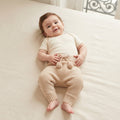 Petit Filippe Tan Knit Pom Pom Drawstring Pull On Pants | 6-9m