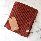 Happy Place Organic Cotton Waffle Knit Baby Blanket in Clay
