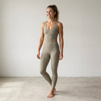 Free People Movement Back It Up Onesie Jumpsuit in Sage Beige | XS