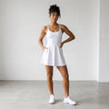 Yitty Active UltraLuxe Strappy Tennis Dress with Built in Shorts in White | S